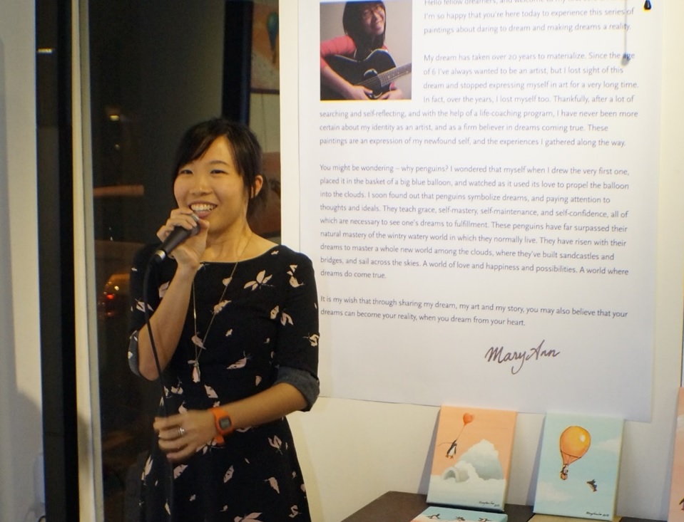 MaryAnn speaking at her first solo exhibition opening reception, 2013